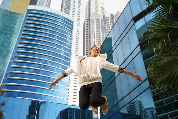 Latina business woman jumping joy happy office smile — Stock Photo, Image