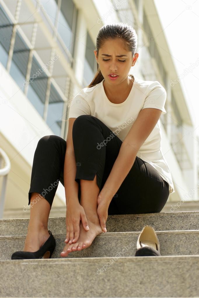 Business Woman Walking On High Heels Feeling Pain At Feet