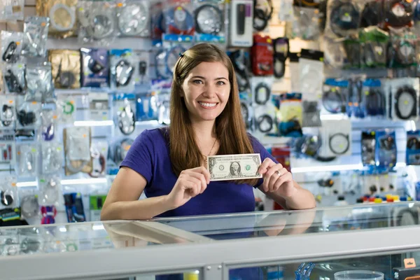 Propietario de la tienda de computadoras Happy Female Showing First Dollar Earn — Foto de Stock