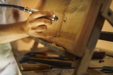 Sculptor Painter Artist Chiseling A Wooden Bas Relief-2