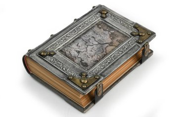 Aged gray leather book with old map, brass corners and the frame lay down to the table isolated captured from the right side clipart