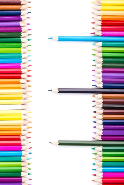 Barevné tužky s tři tužky, stojící na pravém — Stock fotografie