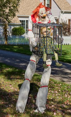Halloween spooky characters /displays on residential lawn in Moreland Hills, Ohio USA