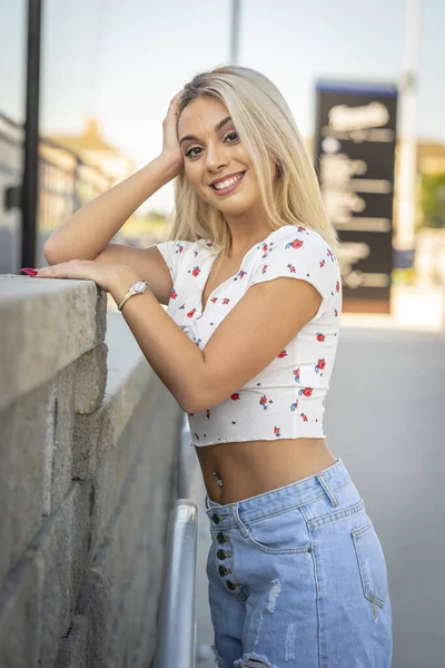 Gorgeous Young Blonde Model Poses Outdoors While Enjoying Summer Day — стоковое фото