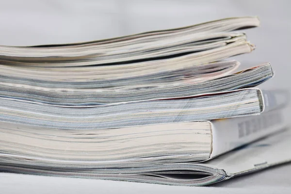 Numerous Magazines Spread Out White Background Studio Environment — Stock Photo, Image