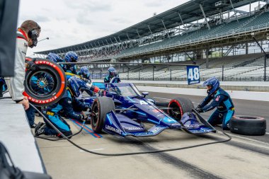 JIMMIE JOHNSON (R) (48) of the United States brings his car in for service during the GMR Grand Prix at Indianapolis Motor Speedway in Indianapolis Indiana. clipart