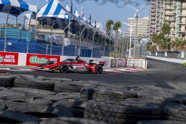 Hollanda 'nın Hoofddorp kentinden RINUS VEEthe (R) (21), Long Beach, Kaliforniya' daki Long Beach Caddeleri 'ndeki Long Beach Acura Grand Prix için antrenman yapıyor..