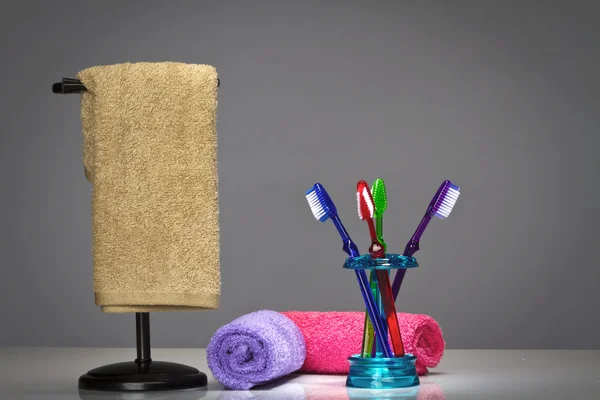 Toothbrush and Bath Towels — Stock Photo, Image