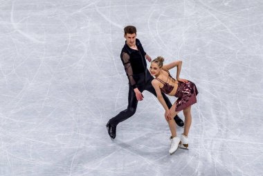 JULIA TURKILA ve MATTHIAS VERSLUIS, İtalya 'nın Milano kentinde yapılacak Milano Cortina 2026 Kış Olimpiyatları için düzenlenen Milano Buz Pateni Arenası' nda düzenlenen Buz Dansı - Ritmik Dans - Takım Etkinliği sırasında performans sergilediler..
