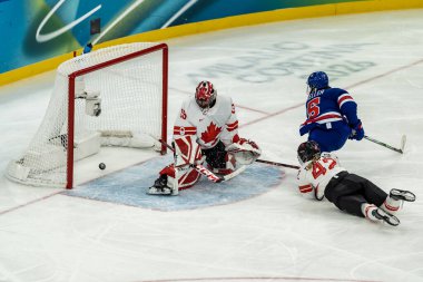 2026 Milano Cortina Kış Olimpiyatları sırasında İtalya 'nın MILAN kentinde oynanan Milano Santagiulia Buz Hokeyi Arena' da oynanan Bayanlar Altın Madalya Maçı uzatma maçında 5..