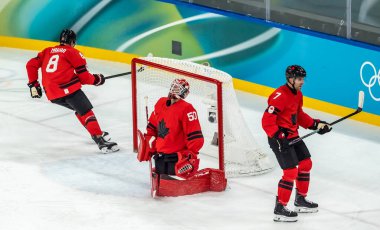 Amerika Birleşik Devletleri forveti Matt Boldy 2026 Milano Cortina Kış Olimpiyatları 'nda İtalya' nın MILAN kentinde oynanan Milano Santagiulia Buz Hokeyi Arena 'da Kanada takımına karşı Mens Team Canada maçında gol attı..