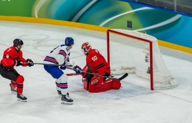 2026 Milano Cortina Kış Olimpiyatları 'nda İtalya' nın MILAN kentinde oynanan Milano Santagiulia Buz Hokeyi Arena 'da, Mens Team Canada karşısında 12 numaralı forvet Matt Boldy ile oynamıştır..