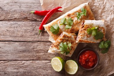 chimichanga with meat and vegetables. horizontal top view