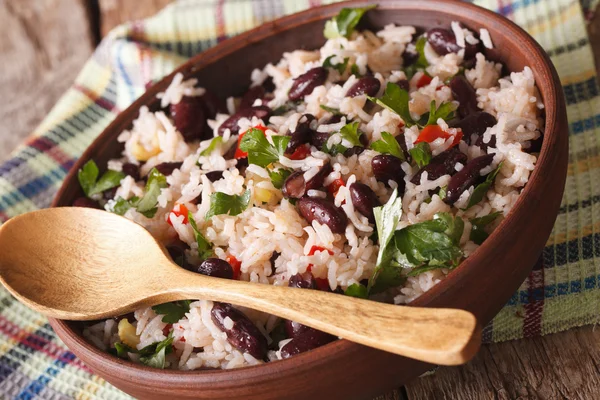 Vegetarian food: rice with red beans in a bowl close-up. horizon — Stock Photo, Image