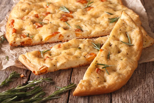 Traditional Italian focaccia with rosemary close up. Horizontal — Stock Photo, Image