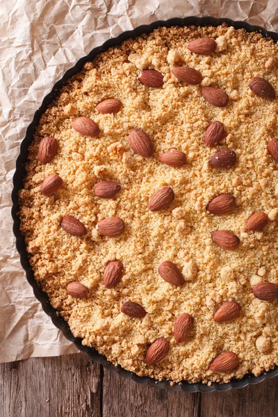 Sbrisolona Italian cake with almonds macro. vertical top view