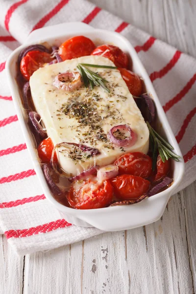 Bouyiourdi: Feta cheese baked with tomatoes closeup. Vertical — Stock Photo, Image