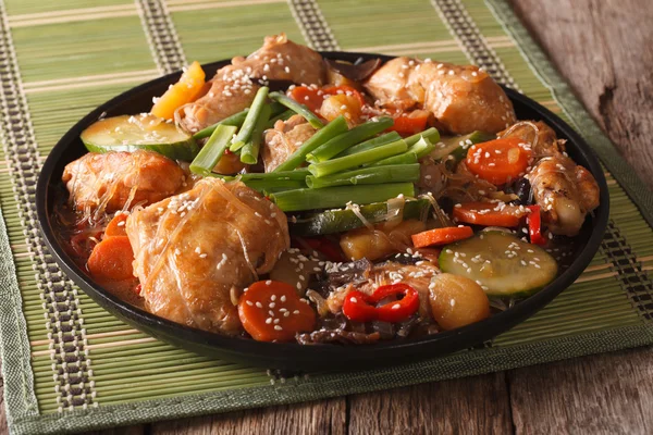 Korean cuisine Dakjim: chicken with vegetables and sesame close- — Stock Photo, Image