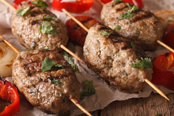 Turkish kebab with grilled vegetables on a table macro. Horizont — Stock Photo, Image