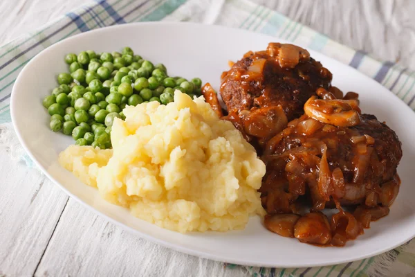 Simple Food: Salisbury steak with mashed potatoes and green peas — Stock Photo, Image