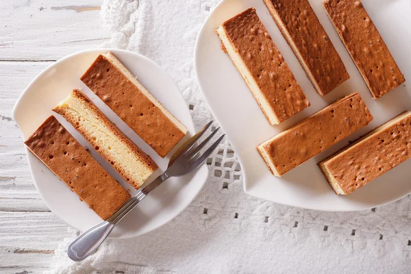 Castella Japanese cake on a plate closeup. horizontal view from — Stock Photo, Image