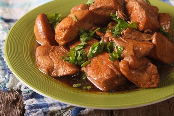 Delicious Filipino Food: Adobo chicken with herbs close-up. hori — Stock Photo, Image
