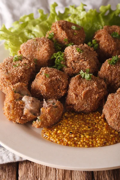 Dutch meat balls with mustard Bitterballen close-up on a plate. — Stock Photo, Image