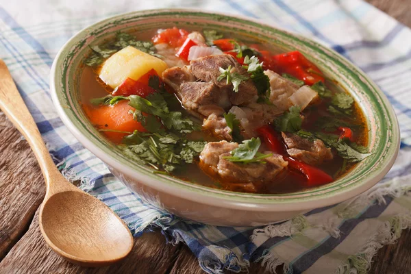 Lamb soup with vegetables closeup at the plate. horizontal — Stock Photo, Image
