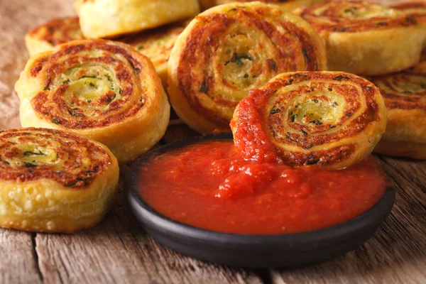 Tasty sliced potato rolls with tomato chutney close-up. Horizont — Stock Photo, Image