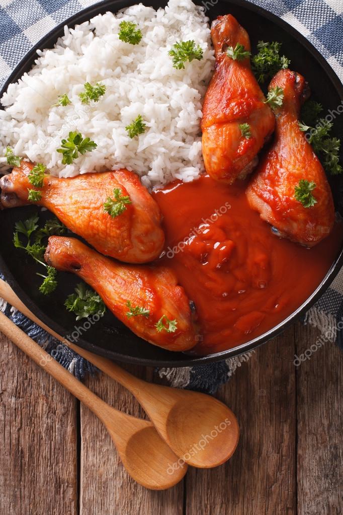 Chicken legs with chilli sauce Sriracha and Rice Verti