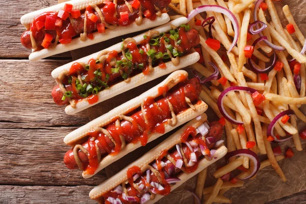 Takeaway: hot dogs and french fries on the table. Horizontal top — Stock Photo, Image