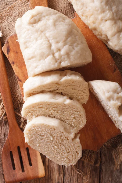 Haşlanmış knedliks ekşi krema makro tablosundaki ile. Dikey üst — Stok fotoğraf