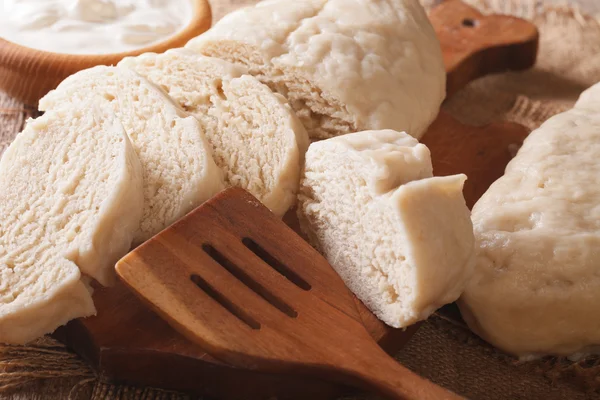 Czech knode sliced close-up on the table. horizontal — Stock Photo, Image