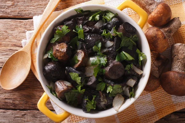 Roasted porcini mushrooms with herbs and spices on wooden backgr — Stock Photo, Image