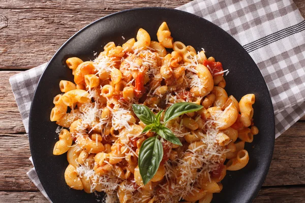 Pasta with kidney bean and parmesan cheese on a plate close-up. — Stock Photo, Image