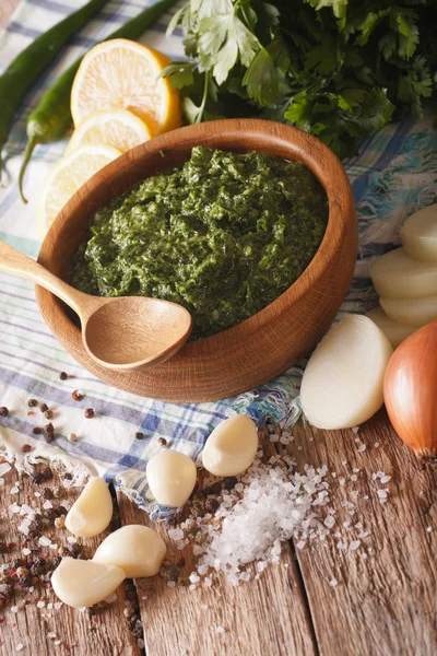 Chimichurri sauce with ingredients close-up. vertical — Stock Photo, Image