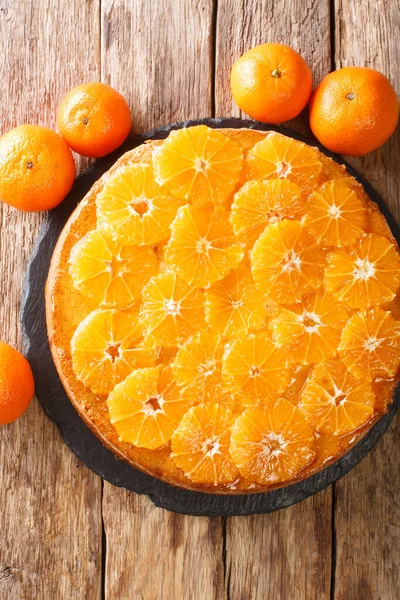 Sliced Sponge Tangerine Pie Close Slate Board Table Vertical Top — Stock Photo, Image