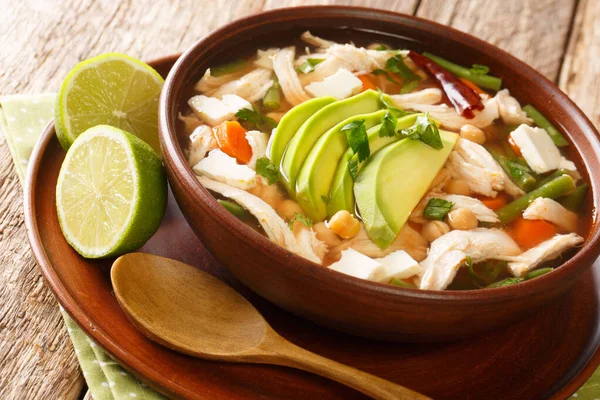 Delicious Mexican Soup Made Chicken Chickpeas Vegetables Close Bowl Table — Fotografia de Stock