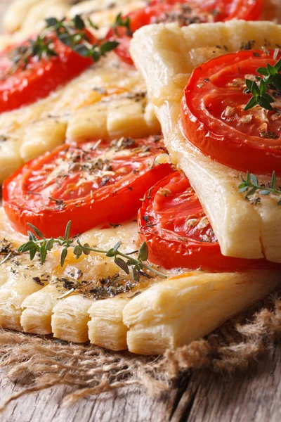 Puff pies with tomato, cheese and herbs macro. vertical — Stock Photo, Image