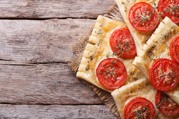 Puff pastry pies stuffed with cheese and tomato top view — Stock Photo, Image