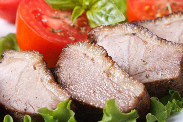 Slices of roasted duck meat fillet with vegetables macro Stock Picture