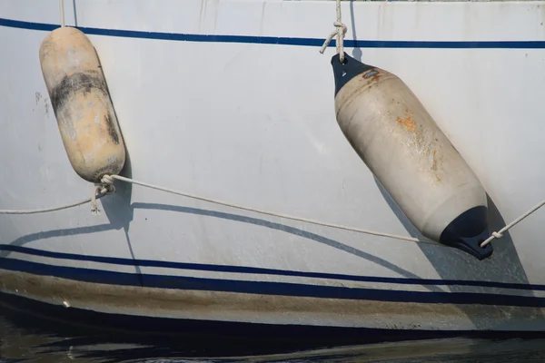 Two fenders on the sides of the boat close up — Stock Photo, Image