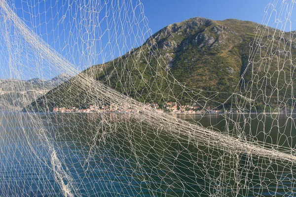 Fisknät på bakgrund av fjärden av Kotor, Montenegro — Stockfoto