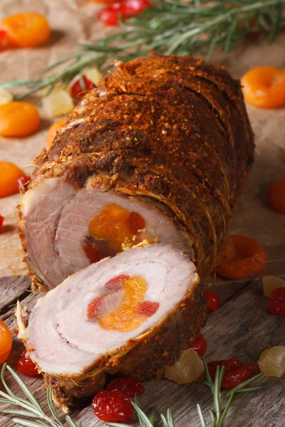 Pork stuffed with dried fruits close up on an old table — Stock Photo, Image