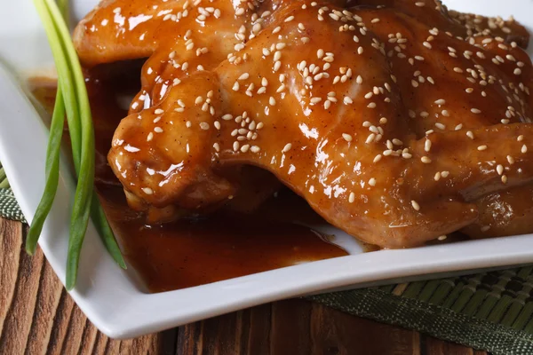 Chicken wings in soy sauce with sesame horizontal — Stock Photo, Image