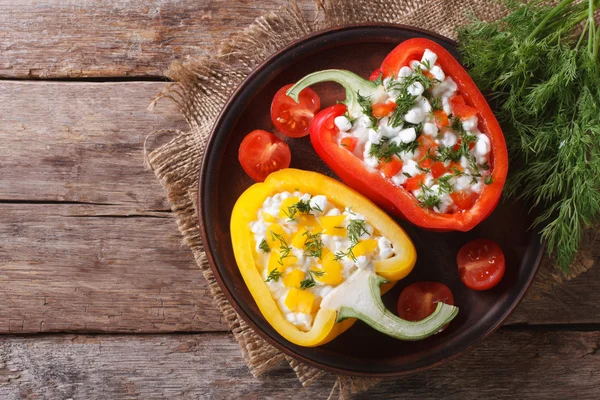 Fresh peppers stuffed with cottage cheese top view horizontal — Stock Photo, Image