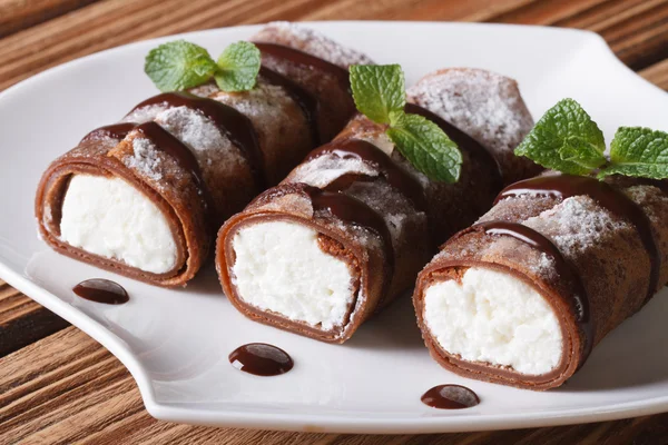Chocolate crepes with cream cheese close-up horizontal — Stock Photo, Image