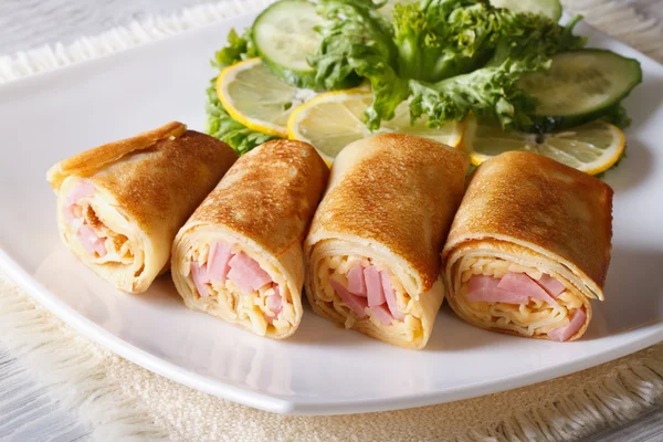 Crepes with ham and cheese close up horizontal — Stock Photo, Image