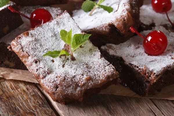 Brownie cake with mint and cherry macro horizontal — Stock Photo, Image