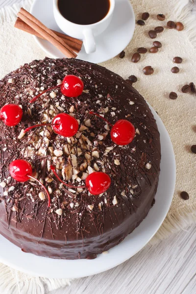 Chocolate cake and coffee vertical top view closeup — Stock Photo, Image